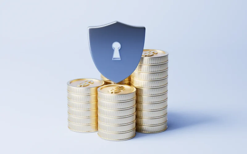 Safety shield and golden coins, 3d rendering.