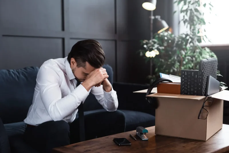 Young man getting fired from his job